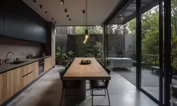 a large long table sitting in the middle of a kitchen