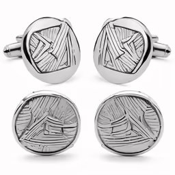 four silver cufflinks with engraving on the front