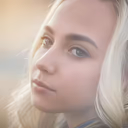 a young woman with light blonde hair and blue eyes