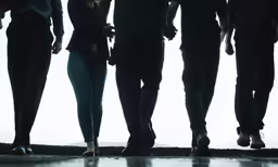 a group of people standing close to each other