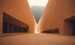 a long empty hallway between two buildings