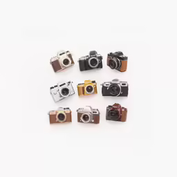 six cameras sitting next to each other