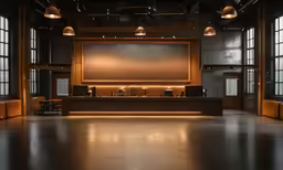 a large screen is on the wall next to a counter