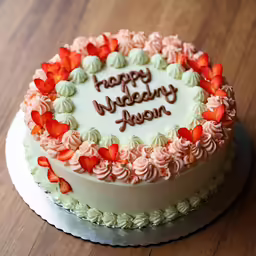a white and red cake with words happy birthday mom