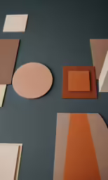 several different colored pieces of paper sitting on a table