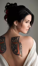 a woman with tattoos has on white fabric
