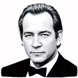 a black and white photo of a man in a tuxedo