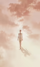 a woman is walking in a white dress