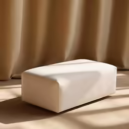 the bed spread is closed up on top of the floor
