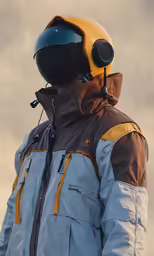 the back of a person in ski gear wearing ski goggles