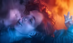 a close up of a person laying on the ground