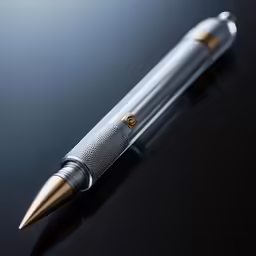 a pen on top of a table with a black surface