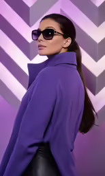 the woman wearing sunglasses has her hair in ponytail
