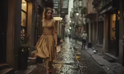 a girl dressed in a dress is walking down the street