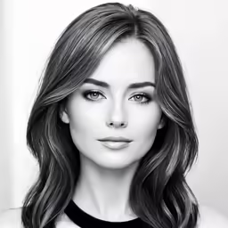 the model is posing in front of a white background