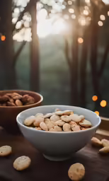 some crackers are in a bowl and on a table