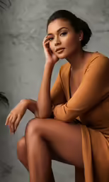 the woman is posing for the picture with her legs crossed
