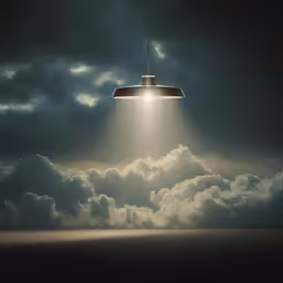 a very large light hanging in the sky