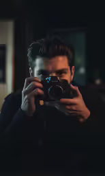 a person is taking a picture in a camera
