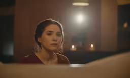 the woman in the photo is staring into the camera