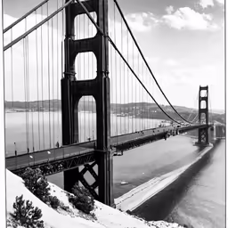 an old black and white photo of a bridge