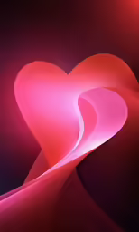 red hearts that are sitting in the dark