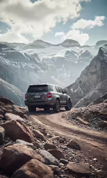 a car that is driving down a dirt road