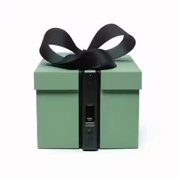 the giftbox has a black ribbon tied around it