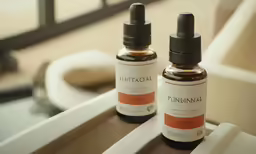 two bottles of nuttalols sitting on top of a table