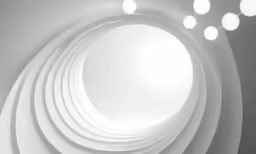 large, circular window has eight different white spheres on it