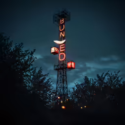 the lit up sign is for a business