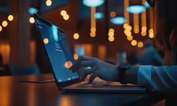 there is a woman on the computer at night