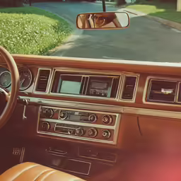 a view of an interior of a car looking out the window