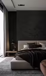 a large black bedroom with lots of pillows and blankets