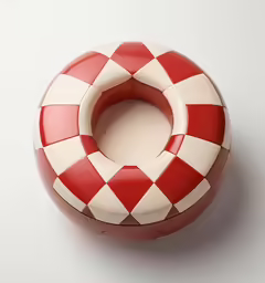 a red and white object has a white circle