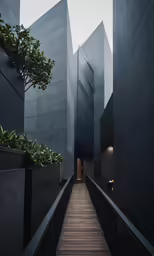 modern building with wooden deck and planters