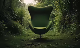 an egg chair is sitting in a wooded area