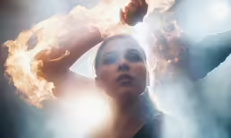 a woman that has some kind of fire