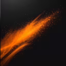 a screen showing an orange light and some speckles of gold on the bottom of it