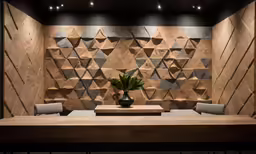 the wall of a restaurant is made up of many shapes and sizes
