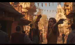 a woman with her hand up on a crowded city street