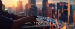 the hands of a professional dj mixing music on a synthesizer