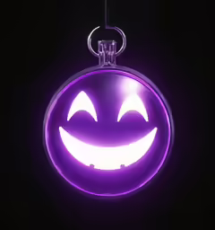 a purple neon smiley face keyring hanging in a dark room