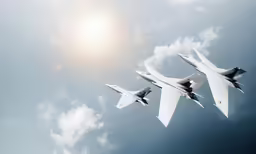 there are three planes flying side by side in the air