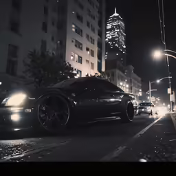 some cars parked by a very tall building at night