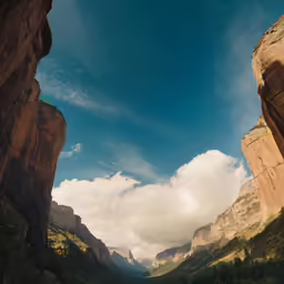 some very tall mountains with a sky above