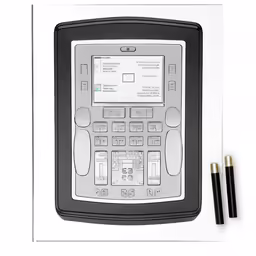 a cell phone sits next to a pair of pencils