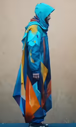 a person dressed in an oversize colorful jacket