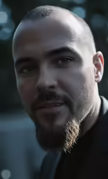 this is a portrait of a bald man