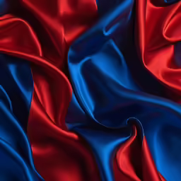 a blue and red cloth with very long folds